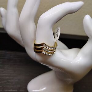 Elegant Gold and Silver Wave Ring